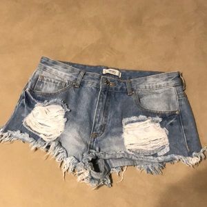 distressed cheeky jean shorts